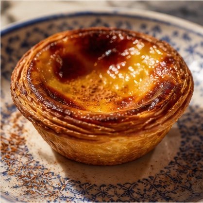 Warm pastel de nata with burnished custard in flaky pastry